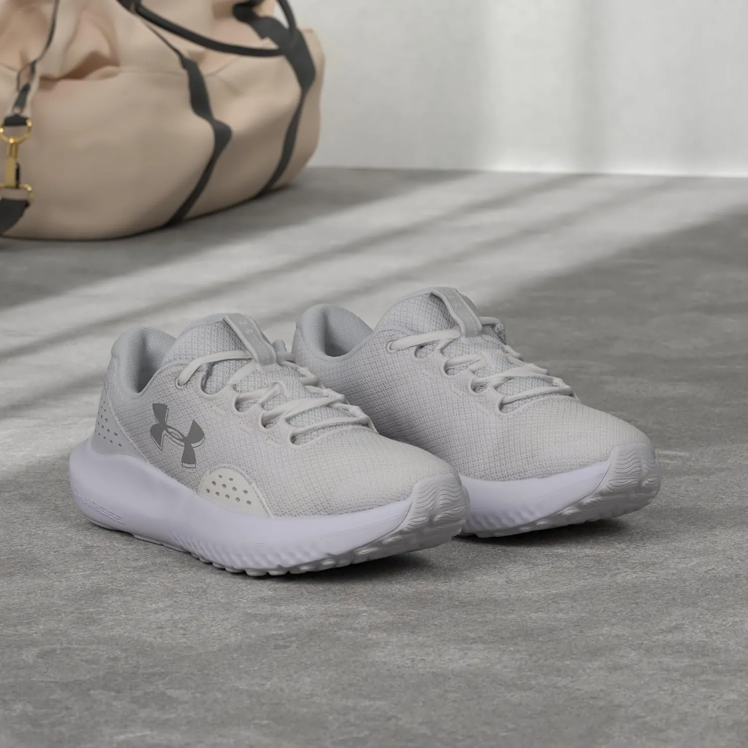 Under Armour Women's Charged Surge 4 Sneaker